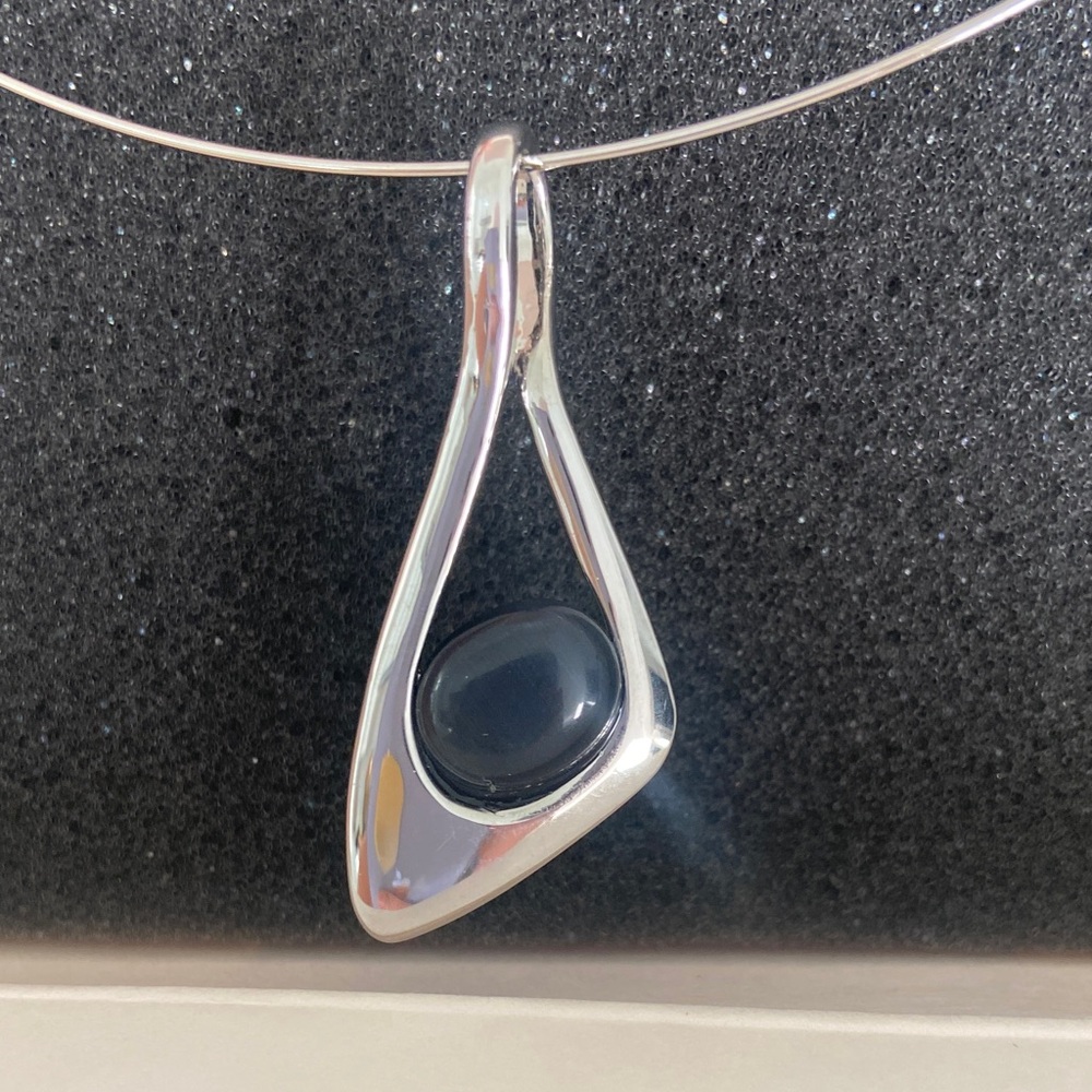 Elegant Silver Pendant with Black Stone